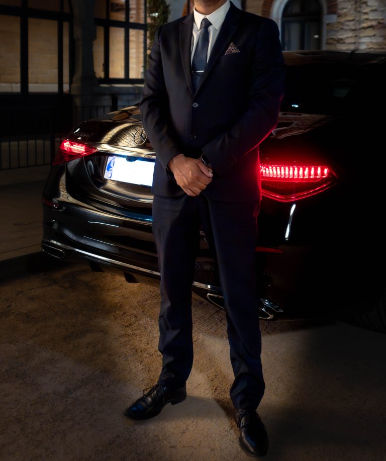 VIP Limousine France - Portrait - Driver Suits - In Front of S Class